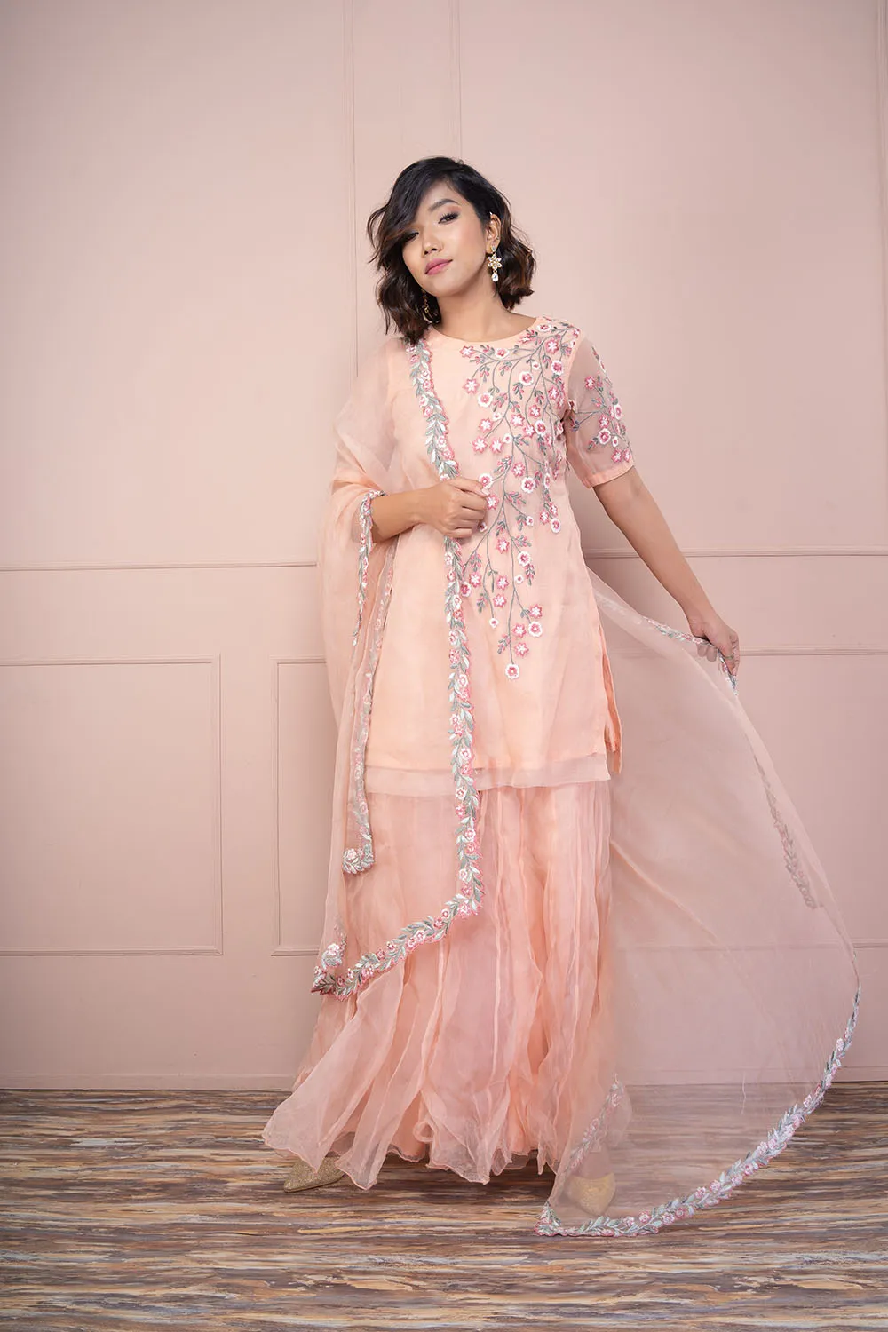 Rose Pink Tunic Paired Up With Sharara And Dupatta