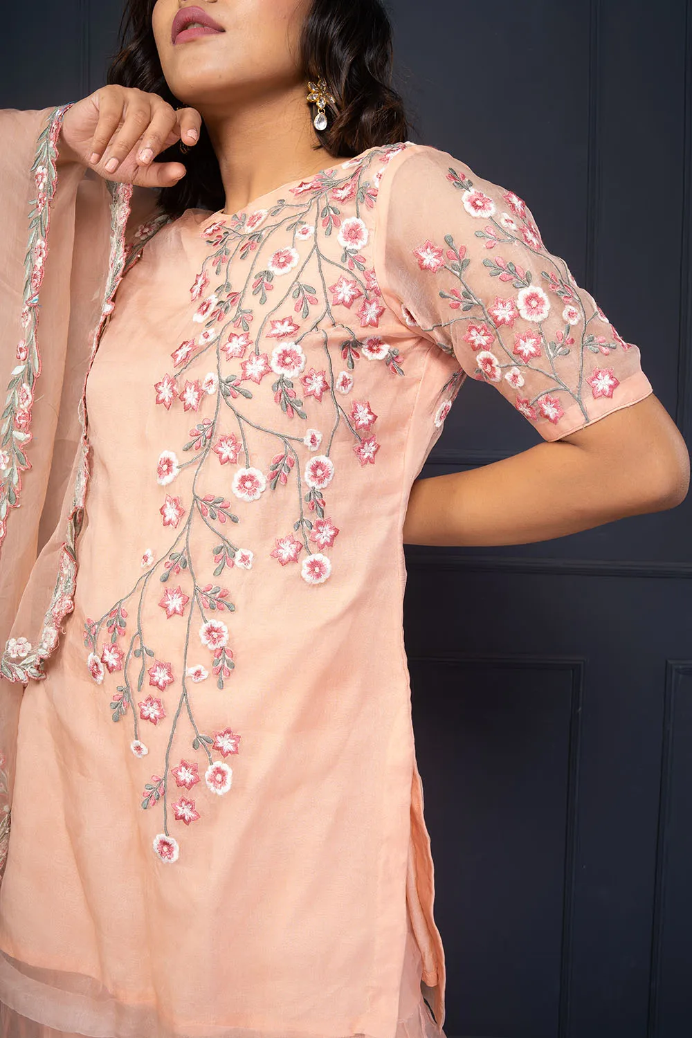 Rose Pink Tunic Paired Up With Sharara And Dupatta