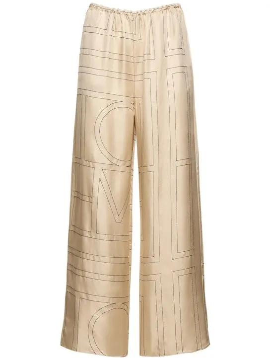 Toteme   Monogram embroidered silk pants 